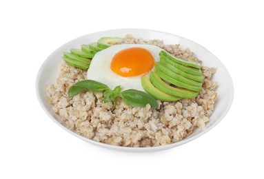 Photo of Delicious boiled oatmeal with fried egg, avocado and basil in bowl isolated on white