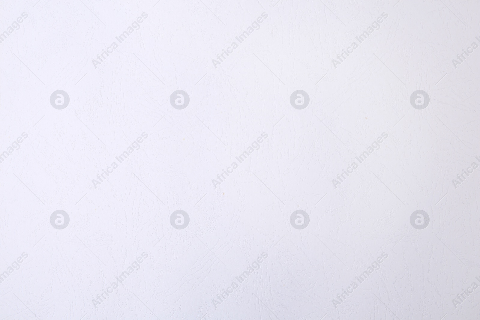 Photo of Texture of white paper sheet as background, top view