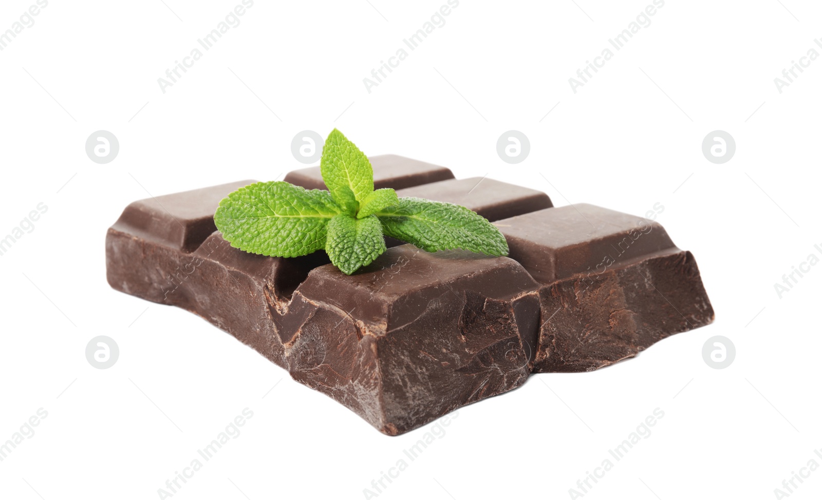 Photo of Tasty chocolate piece with mint on white background