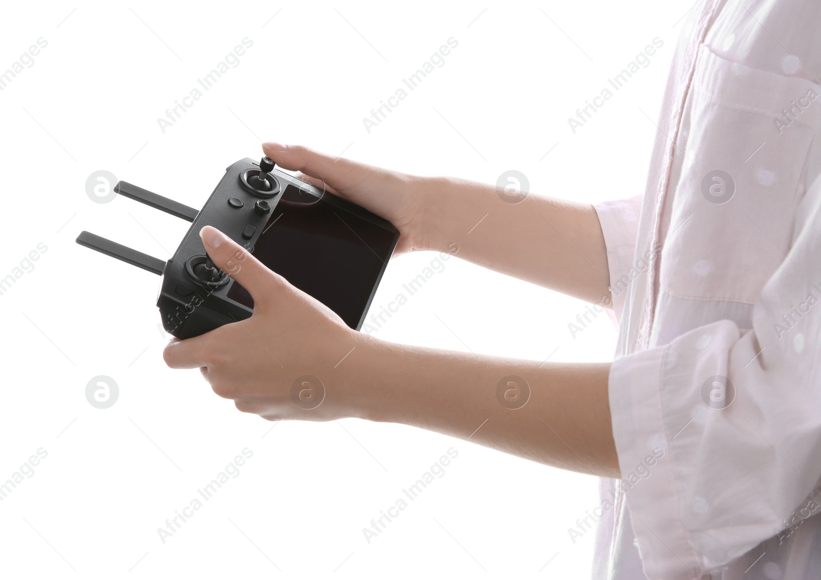 Photo of Woman holding new modern drone controller on white background, closeup of hands