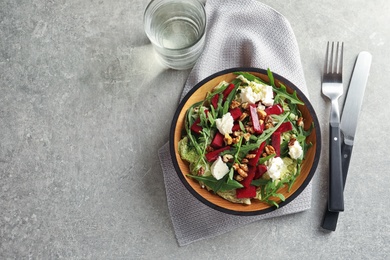 Tasty beets salad on table, flat lay composition with space for text