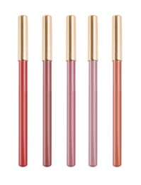 Image of Set with lip pencils of different shades on white background. Decorative cosmetics