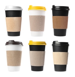 Image of Set with different paper coffee cups on white background 