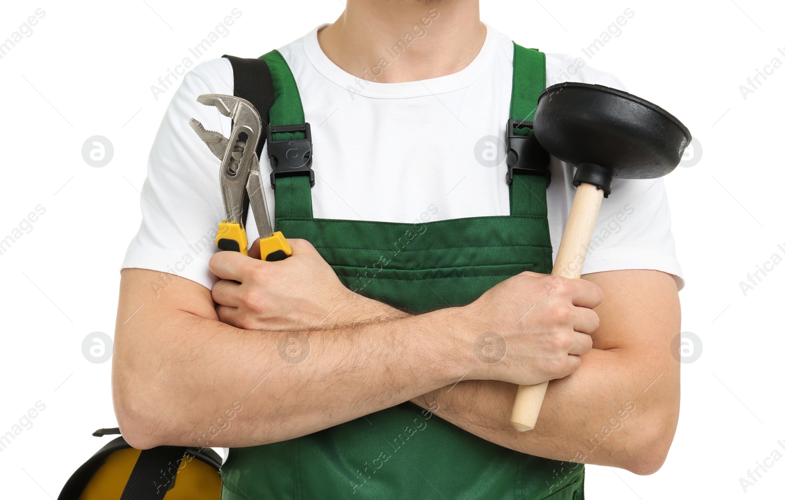 Photo of Young plumber with adjustable wrench and force cup on white background