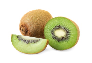 Cut and whole fresh kiwis on white background