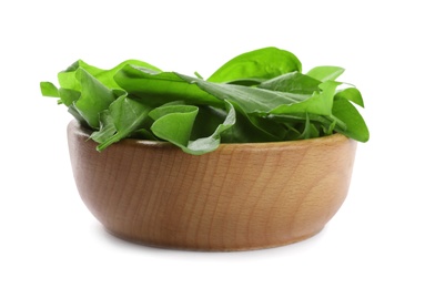 Photo of Fresh green sorrel leaves in wooden bowl isolated on white