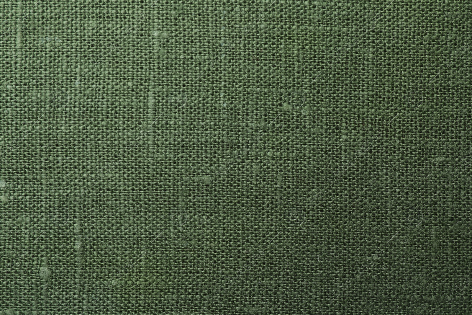 Photo of Texture of green fabric as background, top view