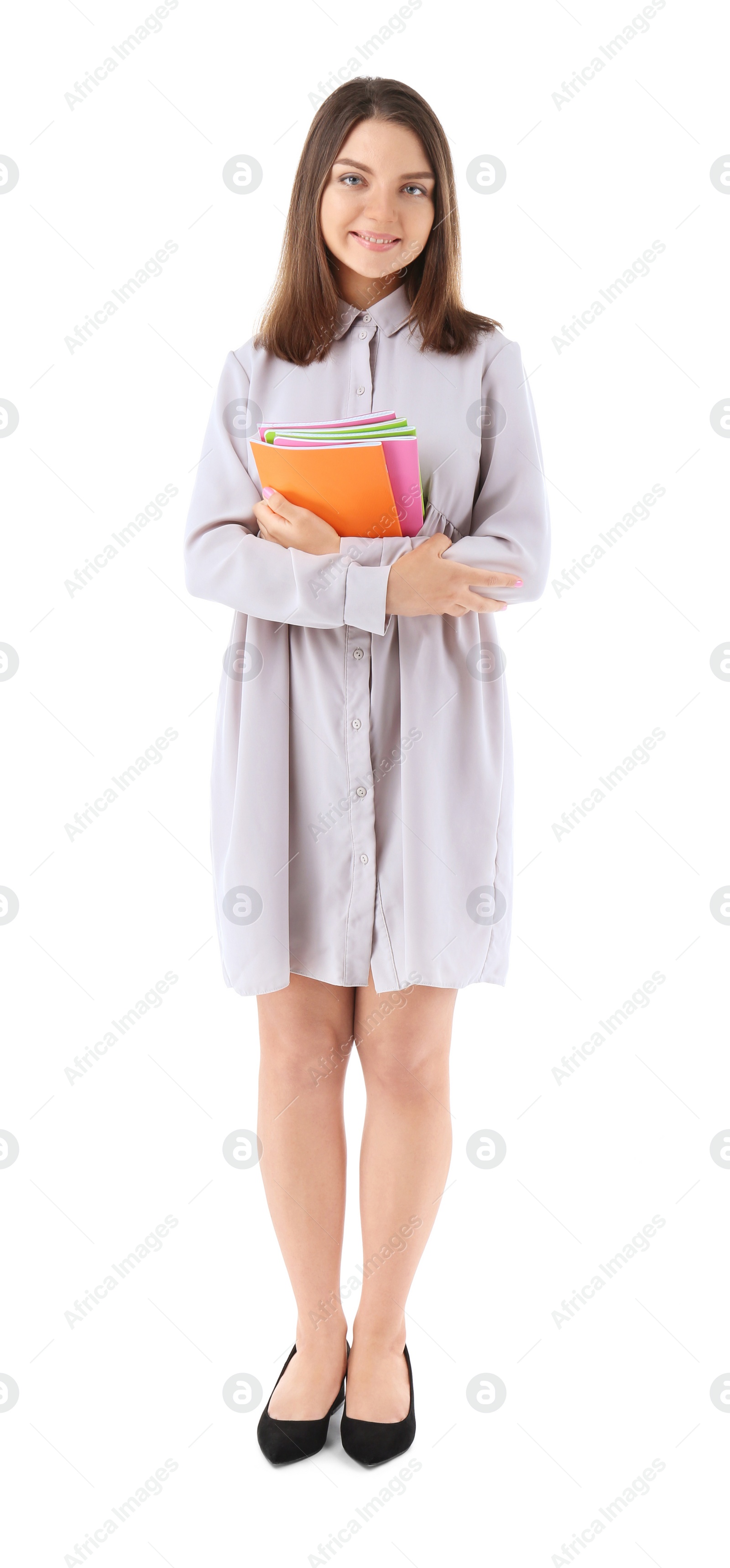 Photo of Female teacher with notebooks on white background