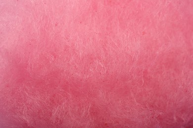 Photo of Sweet pink cotton candy as background, closeup