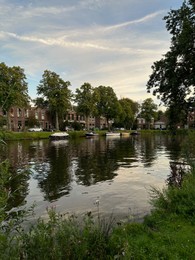 Photo of Beautiful view of canal with moored boats outdoors