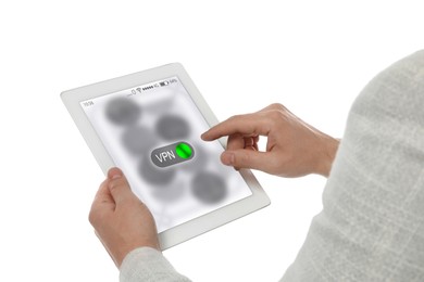 Image of Man using tablet with switch on VPN on white, closeup