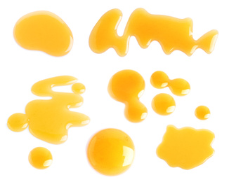 Image of Set of organic delicious honey on white background