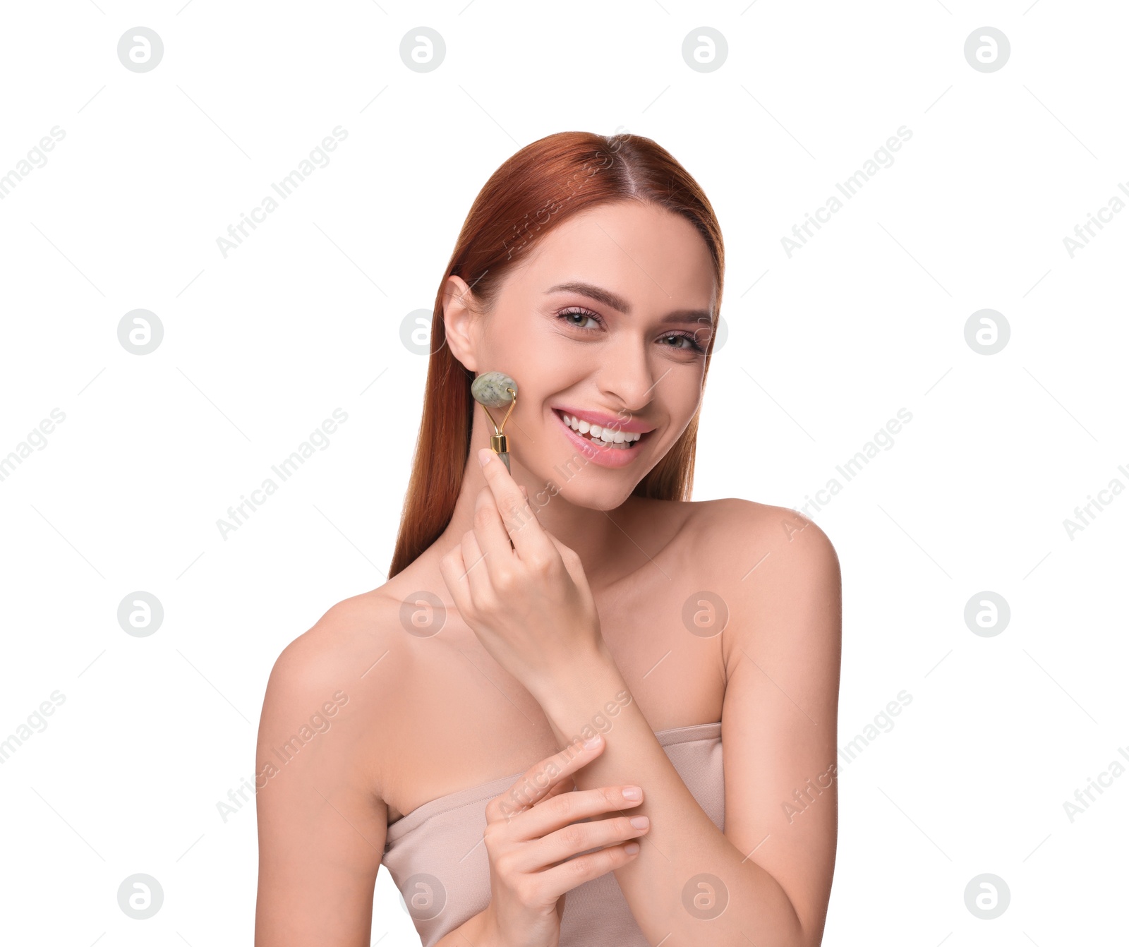 Photo of Young woman massaging her face with jade roller isolated on white