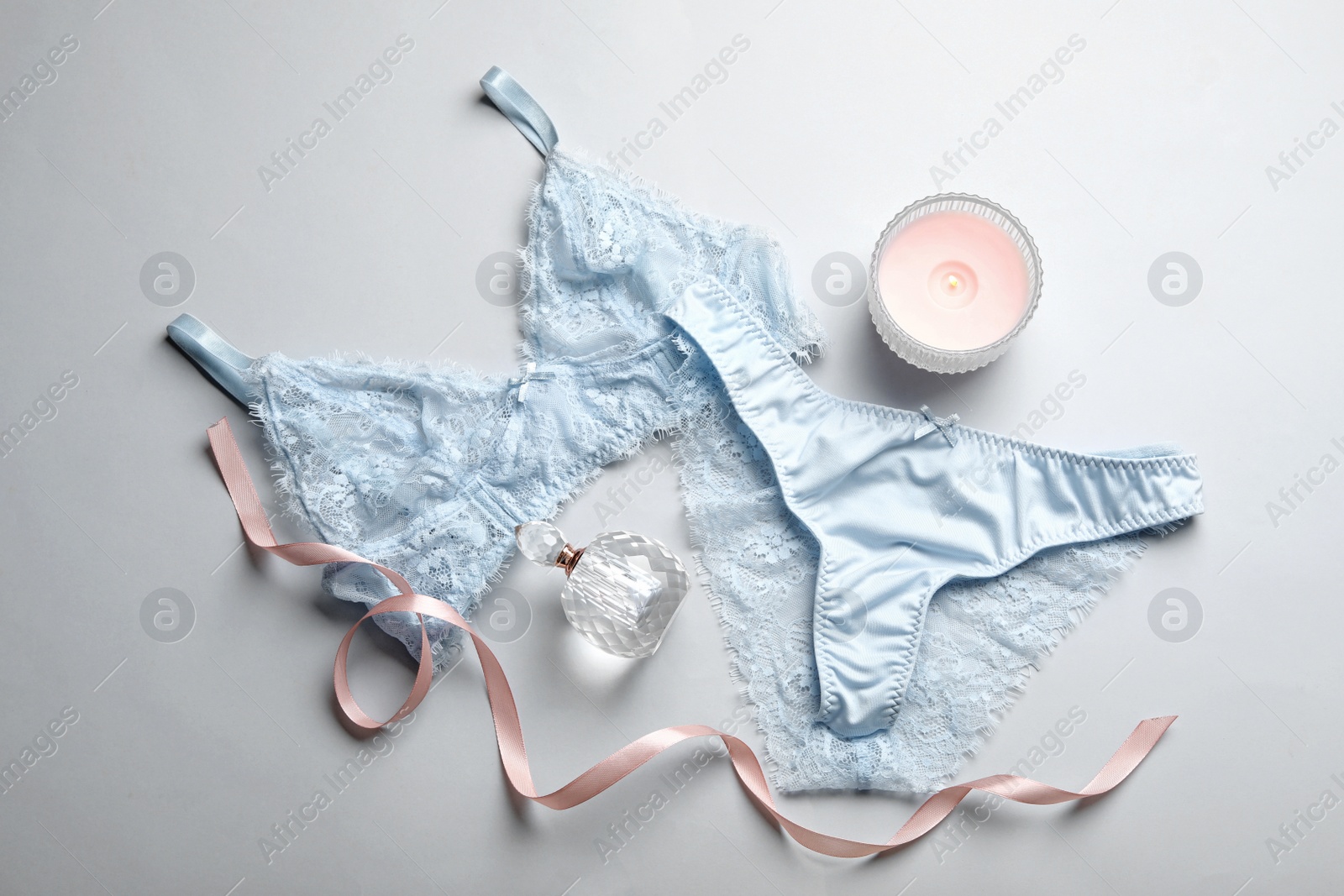 Photo of Composition with women's underwear on white background, flat lay