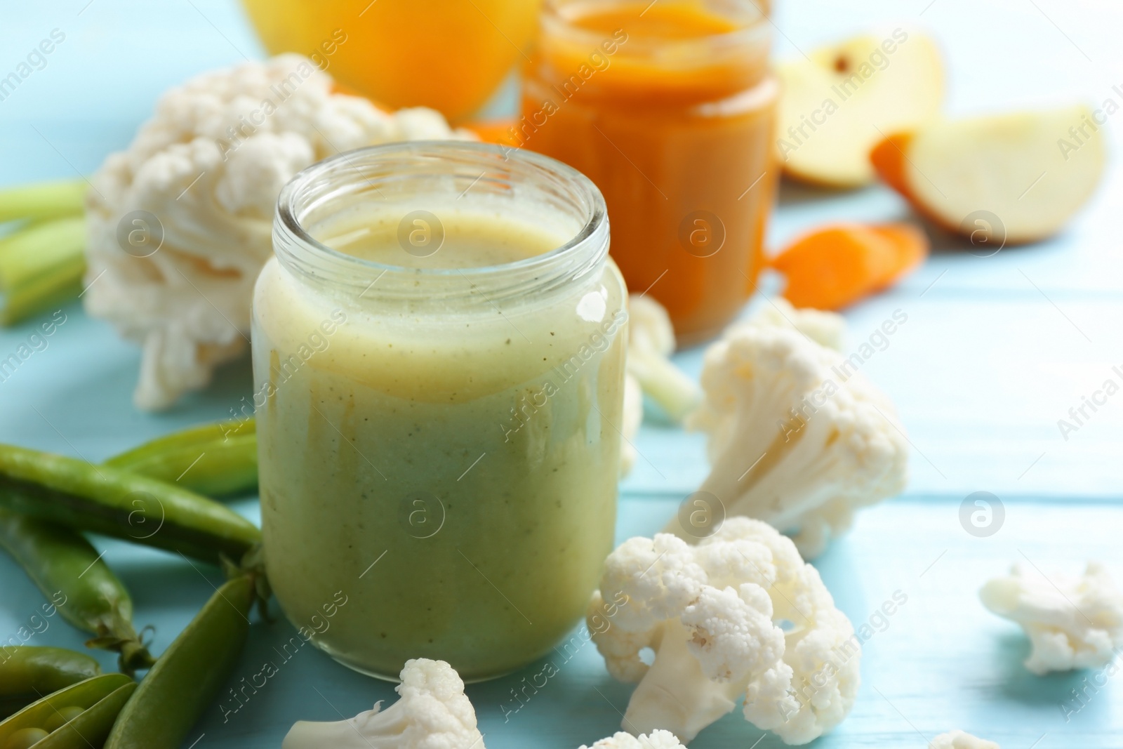 Photo of Jar with tasty baby food on table