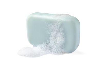 Photo of Soap with fluffy foam on white background