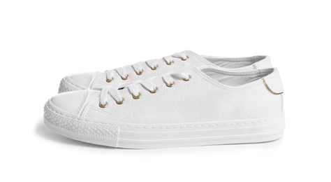 Pair of stylish sneakers on white background