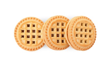 Photo of Tasty sandwich cookies with cream isolated on white, top view