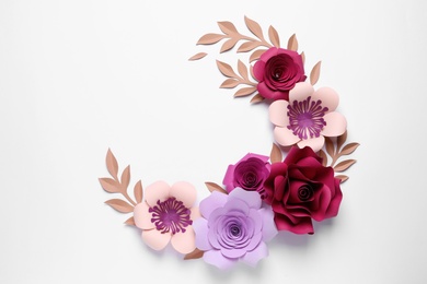 Photo of Different beautiful flowers and branches made of paper on white background, top view