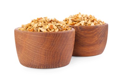 Bowls with dried orange zest seasoning isolated on white