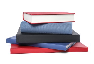 Stack of different hardcover books on white background
