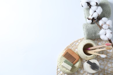 Bath accessories. Flat lay composition with personal care products on white background, space for text