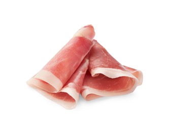 Slices of delicious jamon on white background