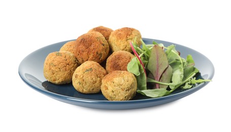 Delicious falafel balls with herbs on white background