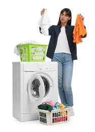 Photo of Beautiful woman with laundry near washing machine on white background