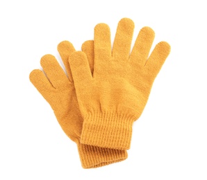 Photo of Yellow woolen gloves on white background, flat lay. Winter clothes