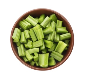 Photo of Bowl of chopped fresh green celery isolated on white, top view