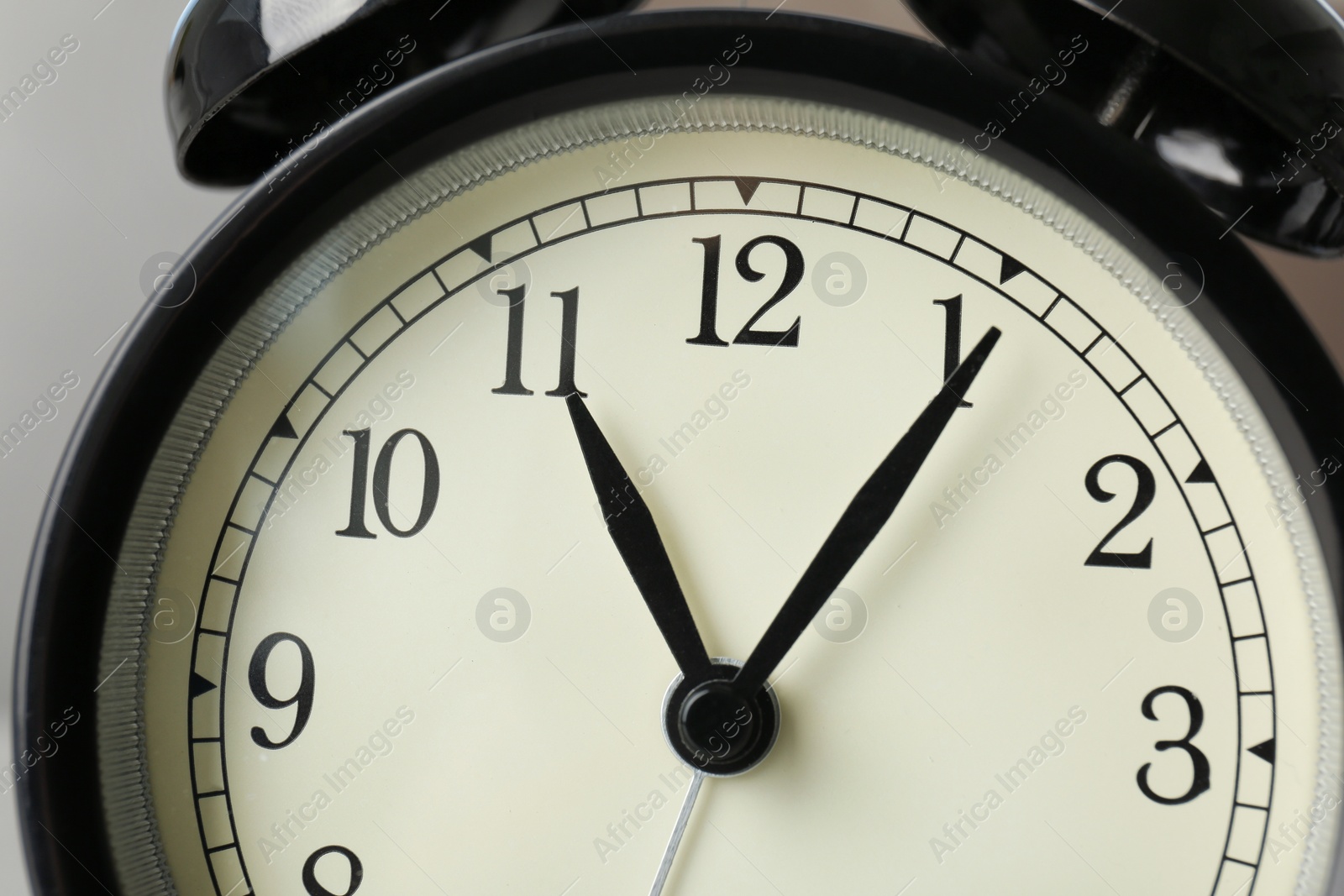 Photo of Alarm clock, closeup. Time change concept