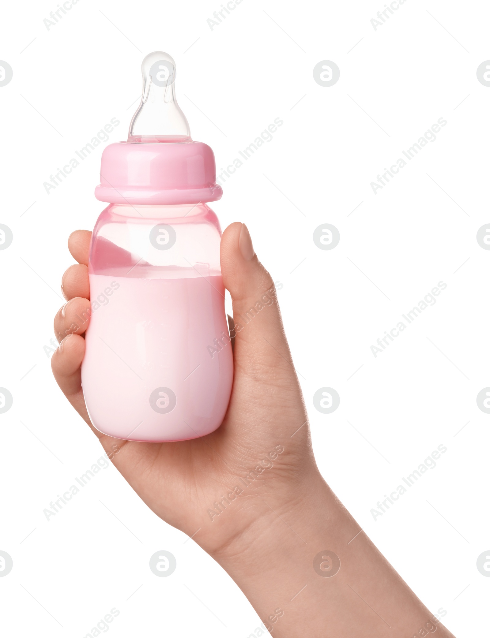 Photo of Woman holding feeding bottle with milk on white background, closeup