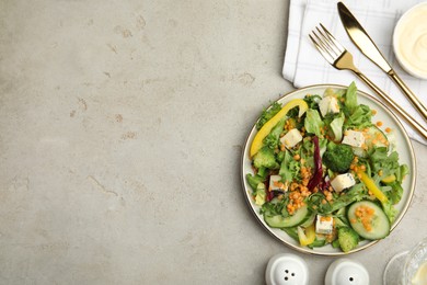 Photo of Delicious salad with lentils, vegetables and cheese served on light grey table, flat lay. Space for text