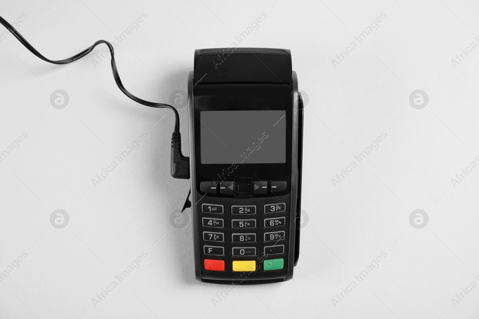 Photo of Modern payment terminal on grey background, top view. Space for text