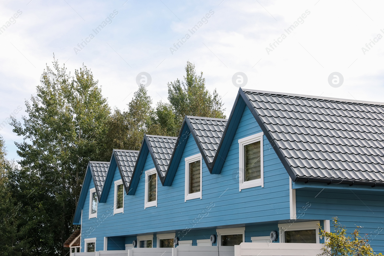 Photo of Exterior of beautiful modern blue houses outdoors