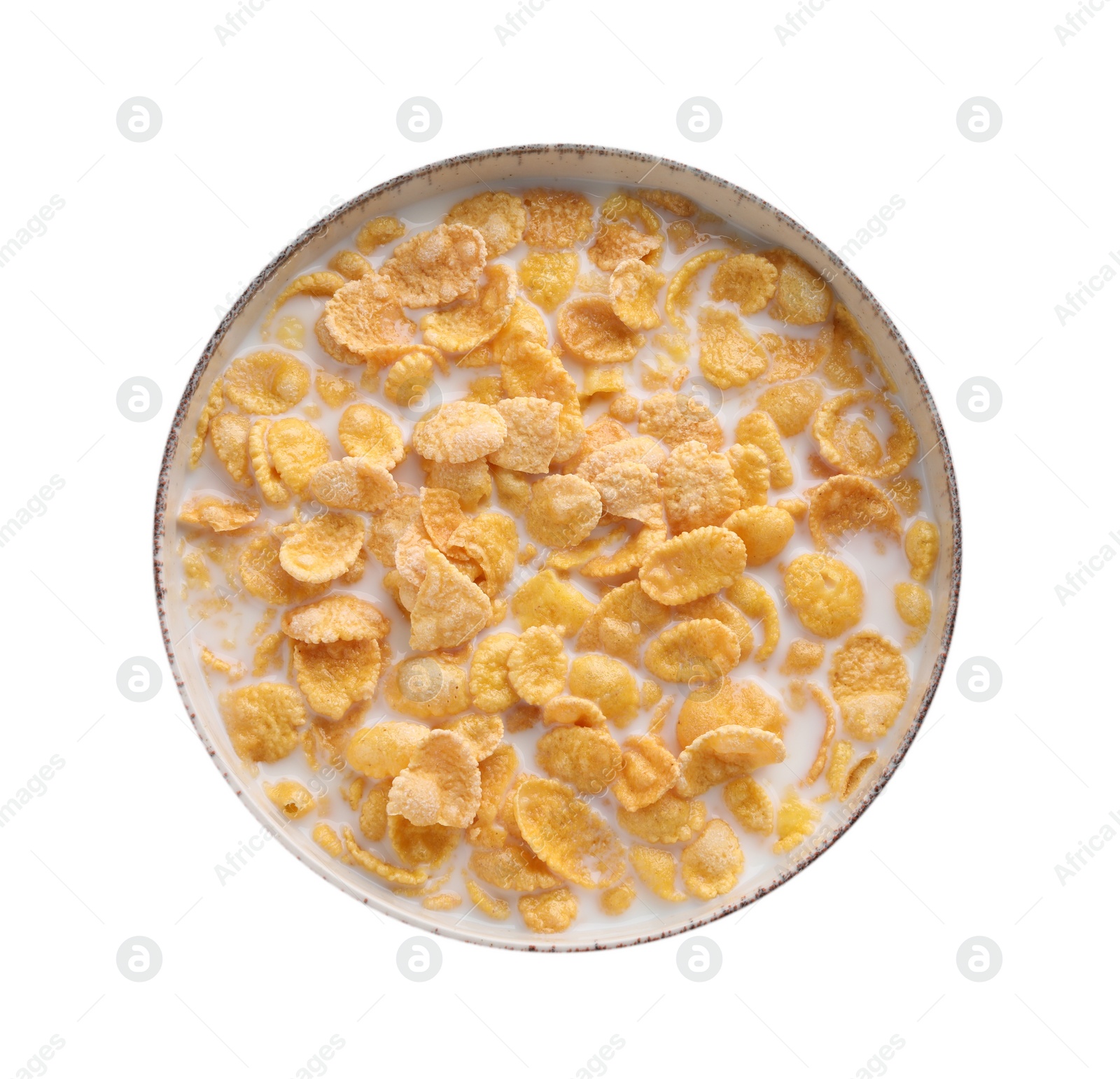 Photo of Tasty corn flakes with milk in bowl isolated on white, top view