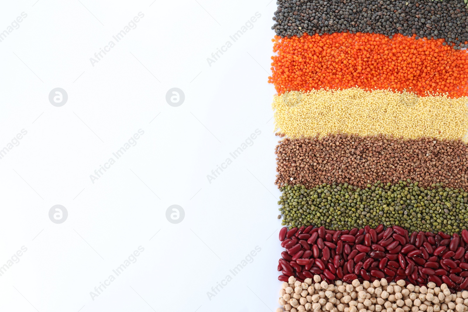 Photo of Different grains and cereals on white background, top view