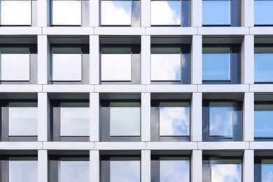 Modern building with tined windows, low angle view