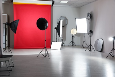 Interior of modern photo studio with professional equipment