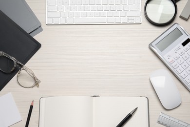 Photo of Composition with keyboard, notebooks and magnifying glass on white wooden table, flat lay. Space for text