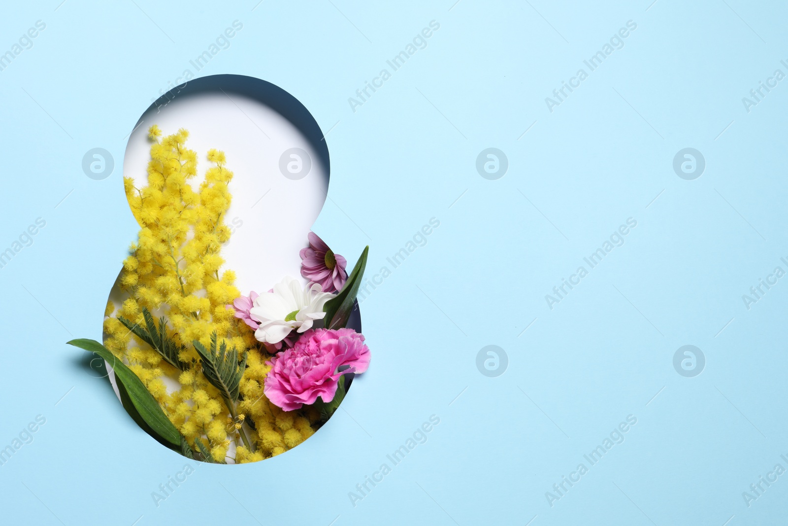 Photo of 8 March greeting card design with flowers and space for text, top view. Happy International Women's Day