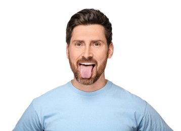 Photo of Man showing his tongue on white background