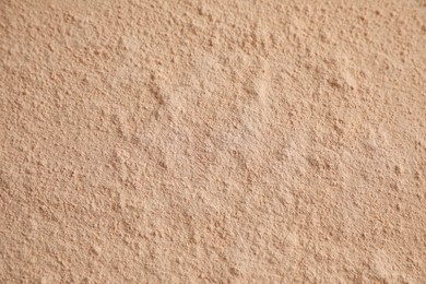 Loose face powder as background, closeup view