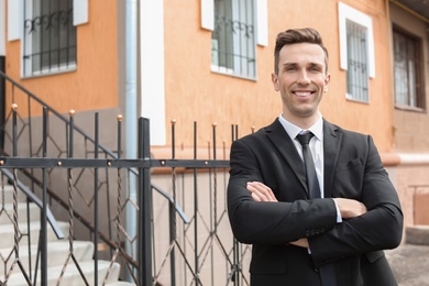 Male real estate agent outdoors