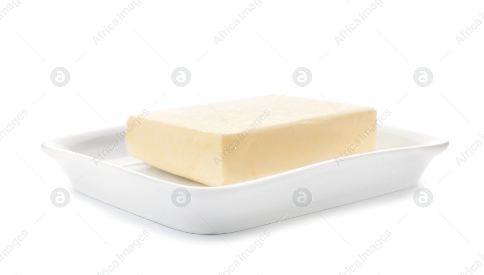 Photo of Plate with tasty fresh butter on white background