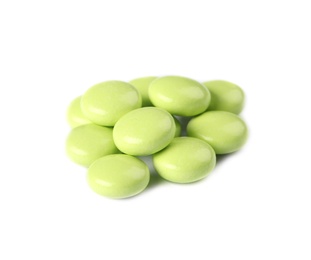 Photo of Pile of color pills on white background