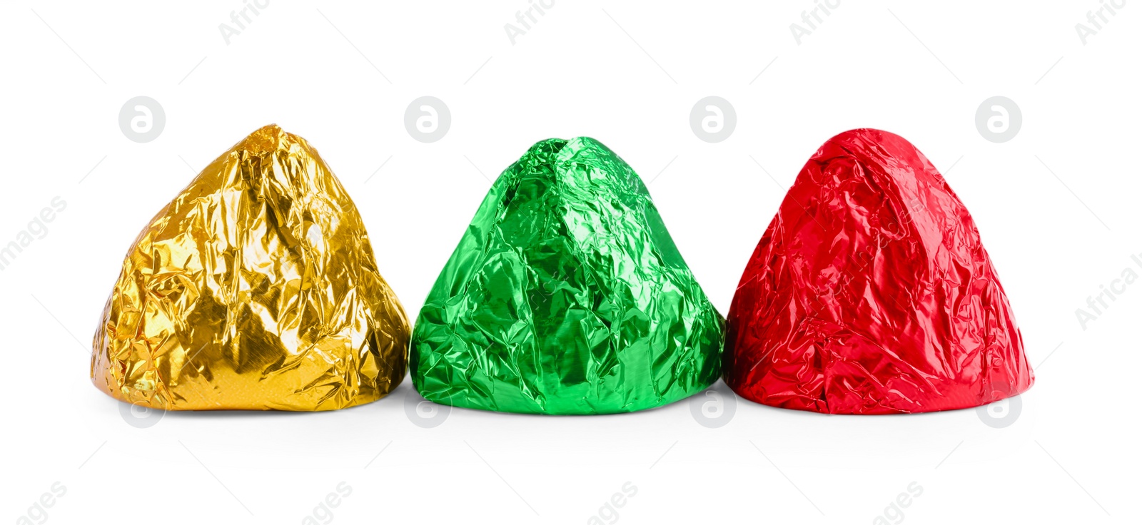 Photo of Tasty candies in colorful wrappers isolated on white
