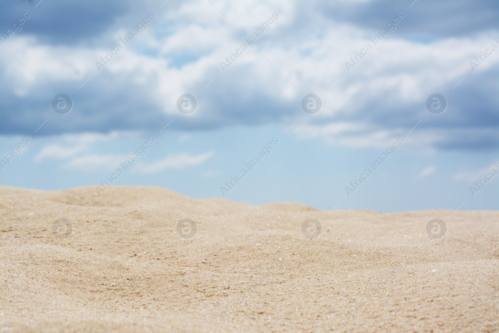 Photo of Beautiful view of sand in desert under cloudy sky