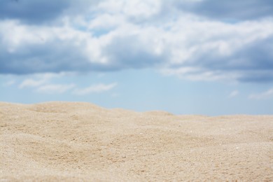 Photo of Beautiful view of sand in desert under cloudy sky